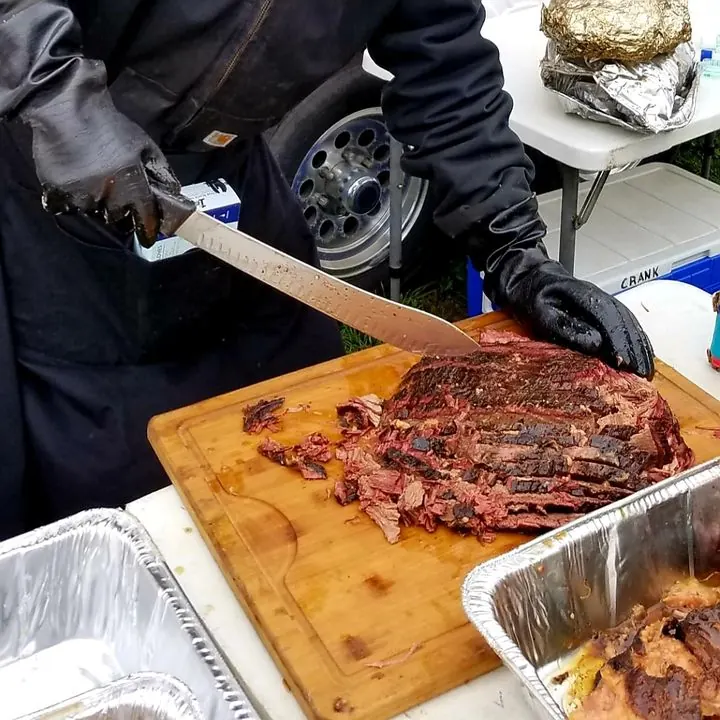 Smokey Dave slicing smoked brisket